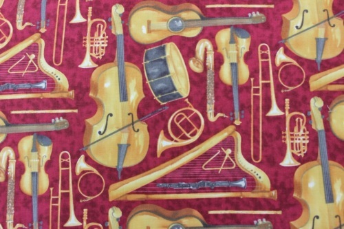 Maestro Cotton - Musical instruments on red background