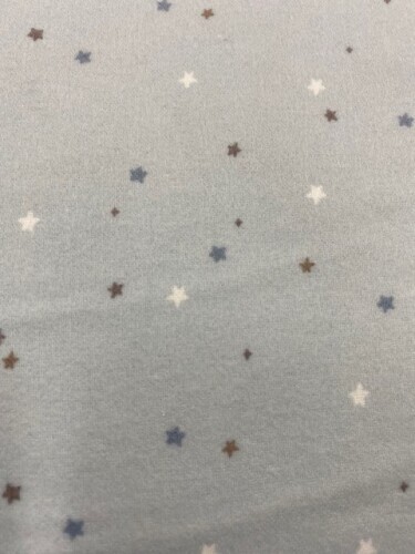 Till the Cows Come Home Flannel - Tiny blue, grey and white stars on light blue background (blue background colour doesn't show as the true colour)