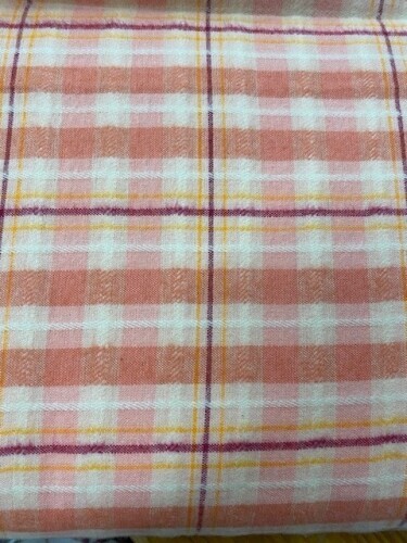 Highlands Flannel - Check plaid in primrose & cream with darker pink accent. Please note as this fabric is woven it will be cut along the woven lines.