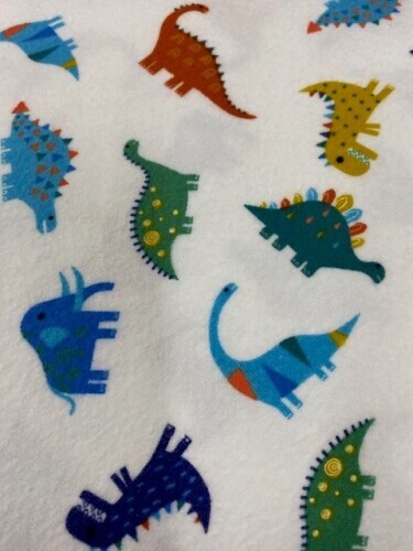 Stella Flannel - Small multi coloured dinosaurs on white background