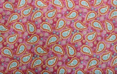 Bright paisley design of red & blue with small flowers on bright pink background 
