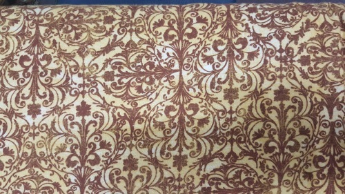 Windflower Flannel - Brown fleur de lis on gold background