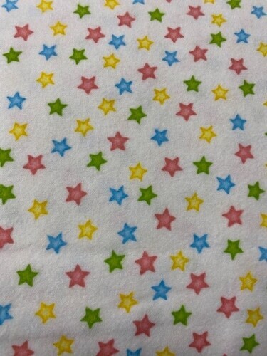 Time Well Spent Flannel - Multi coloured stars on white background