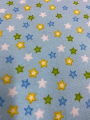 Time Well Spent Flannel - Multi coloured stars on blue background